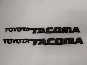 95 96 97 98 99-04 Toyota Tacoma Front Door Emblems Matte Blk **PAIR** - Bild 1 von 2