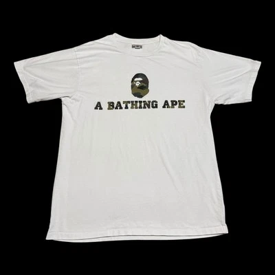 Camisa A Bathing Ape camuflaje deletreada blanca mezcla de algodón adulto XL Foto 1 de 4