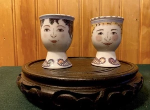 Par único de tazas de huevos de MARION BRANDIS CERÁMICA PORCELANA CARAS PINTADAS - Imagen 1 de 10