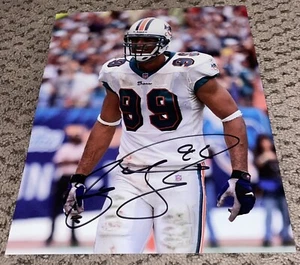 JASON TAYLOR SIGNED 8X10 PHOTO MIAMI DOLPHINS FOOTBALL AUTOGRAPH AUTO - Picture 1 of 1