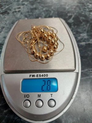 Collar Add-a-Bead Oro Amarillo 14K 23 Cuentas 31" 2.8 gr + Cuentas Bonus de Ónix Negro Foto 1 de 4