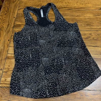 Camiseta sin mangas Fabletics Aventura para mujer negra blanca patrón constelación talla Lg Foto 1 de 4