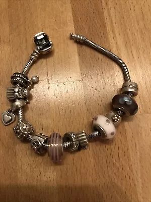 Original Pandora Armband mit 12 Original Pandora Charms mit Gold und Rubin, Clip - Bild 1 von 4