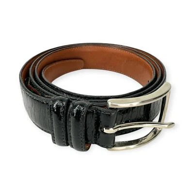 Joseph Abboud | Cinturón con hebilla plateada doble lazo negro 'Dress Croc' para hombre talla 42 Foto 1 de 4
