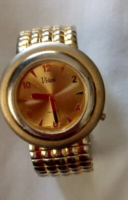 Reloj de cuarzo Vivani tono dorado esfera de 12 horas banda elástica para mujer 8" envío gratuito Foto 1 de 4