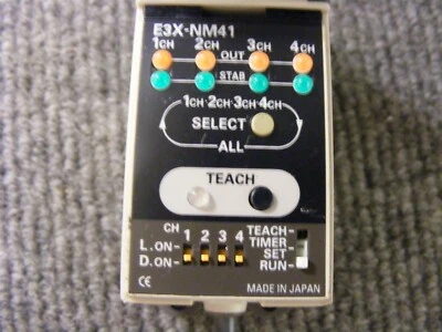 Omron Teaching Fiber Optic Photoelectric 4 Channel Sensor Cat No. E3X-NM41. - Image 1 of 3