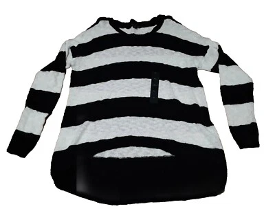 Suéter a rayas blanco y negro marca Attention Foto 1 de 4