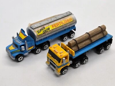 Micro Machines Semi Trucks #7 Lumberjacks Fertilizer Trailer & Log Hauler Lot - Image 1 of 4