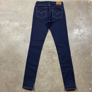 Pantalones de mezclilla ajustados Levi’s Premium 711 25x32 lavado oscuro Big E tiro medio elásticos - Imagen 1 de 9