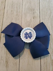 Moño de pelo irlandés de lucha Notre Dame moño Notre Dame - Imagen 1 de 1