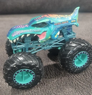 Camión Hot Wheels Monster Jam Mega Wrex Dinosaur 1:64 2022 Foto 1 de 4