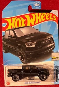HOT WHEELS 2020 RAM 1500 REBEL BLACK 24/250. SEE COMBINED OFFERS! - Picture 1 of 1