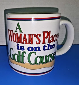 Russ Berrie & Co. Golfing Kaffeebecher "A Woman's Place is on the Golf Course" - Bild 1 von 10