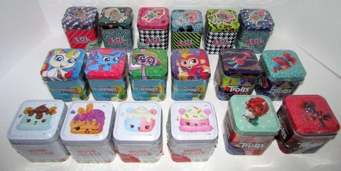 MIXED BULK LOT OF (18) SURPRISE TINS LOL SURPRISE.NUM NOMS,TROLLS & FINGERLINGS Cover