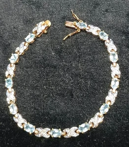 PULSERA TENIS 7" PLATA ESTERLINA/ORO LAVADO AGUAMARINA Y MARCASITA... - Imagen 1 de 4