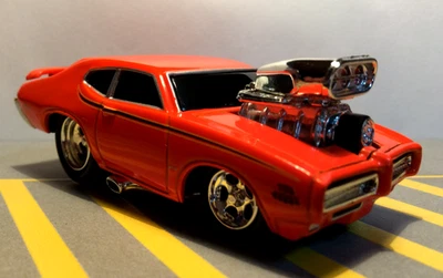 MUSCLE MACHINES 1969 PONTIAC GTO JUDGE - EDICIÓN LIMITADA 1/64 69 - NARANJA Foto 1 de 4