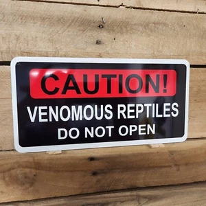PRECAUCIÓN, REPTILES VENENOSOS, NO ABRIR, vida silvestre, letrero, zoológico, advertencia, peligro - Imagen 1 de 1