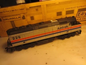 HO trains; A near mint (dummy) LIFE LIKE track ready AMTRAK road diesel - Picture 1 of 6