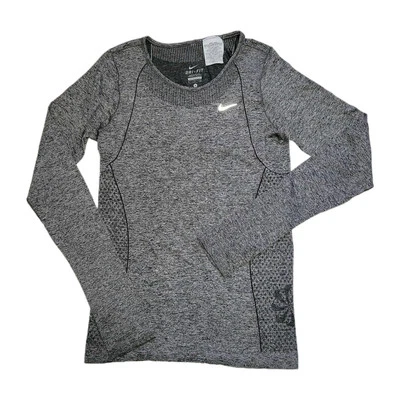 Camiseta de entrenamiento Nike Dri-Fit tejida para mujer manga larga agujeros para los pulgares pequeña Foto 1 de 4