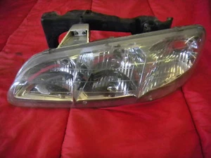 1998 Grand Am DRIVER'S side Headlight - Picture 1 of 2
