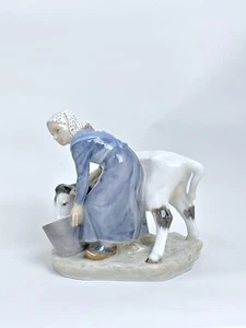 Royal Copenhagen -- Girl with Calf. No 799 - Picture 1 of 11