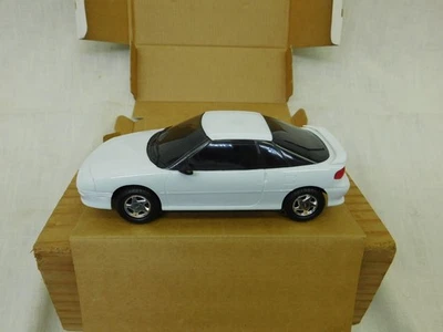 NEW AMT 1/25 SCALE 1992 GEO STORM GSI  WHITE    PROMO MODEL ERTL - Image 1 of 4