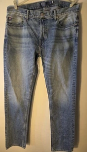 Pantalones de mezclilla para hombre Polo Ralph Lauren Team EE. UU. Active Taper Jeans en azul medio 36x34 - Imagen 1 de 11