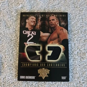 2004 Fleer WWE Champions And Contenders Eddie Guerrero And Even Used Test Shirt - Bild 1 von 2