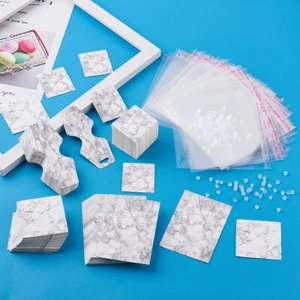 4 Styles Carboard Earring Display Cards with Cellophane Bags & Plastic Ear Nuts - Imagen 1 de 8