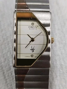 VINTAGE THE ORYX QUARZ HALBMOND DUALTONE DAMEN SS UHR ASYMMETRISCH FUNKTIONIERT  - Bild 1 von 8