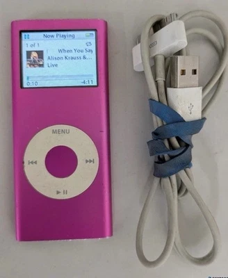 iPod usado funcionando rosa y lindo y canciones incluidas de la década de 2000 Foto 1 de 4