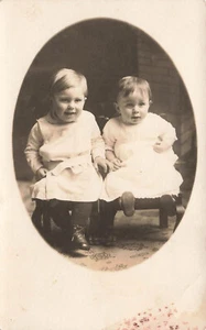 VINTAGE RPPC REAL PHOTO POSTCARD TWO BABIES ON CHAIRS c 1910 012924 T - Picture 1 of 2