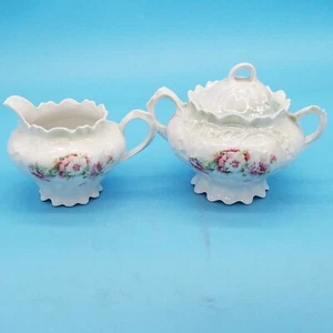 De colección. Antiguo azucarero de porcelana estilo europeo y crema diseño floral - Imagen 1 de 12