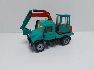 Cargador hidráulico Siku Super Serie 2537 Unimog Mercedes 1:55 coche modelo EXCELENTE raro - Imagen 1 de 10