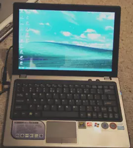 Founder Tech R211 Laptop - Windows XP; 32 bit, x86; Intel Celeron M430 CPU - Picture 1 of 14