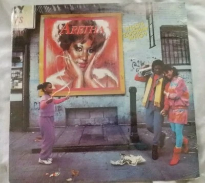 ARETHA FRANKLIN: WHO'S ZOOMIN' WHO?  ARISTA AL8-8286; NEW, SEALED 12" CUT OUT LP - Image 1 of 3