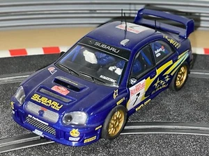 1131- Scalextric TecniToys SUBARU IMPREZA WRC #7 Rallye Monte-Carlo 2003 Solberg - Bild 1 von 3