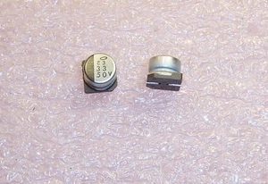 QTY (50) 33uf 50V SMD ALUMINUM ELECTROLYTIC CAPACITORS UUR1H330MBR1GS NICHICON - Picture 1 of 2
