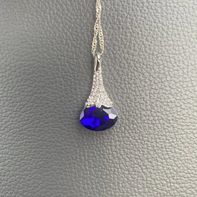 Beautiful Silver Tone Necklace with Blue Tourmaline Pendant - Image 1 of 3