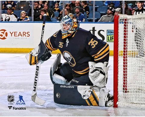 Linus Ullmark Buffalo Sabres Unsigned Blue Jersey in Net Photograph Cover