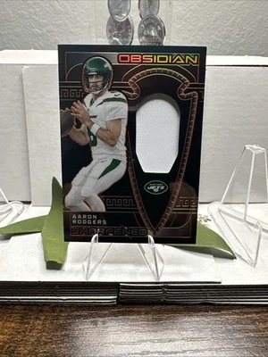 Parche afilado verde Panini Obsidian Aaron Rodgers 2023/49 Jets primera impresión Foto 1 de 4