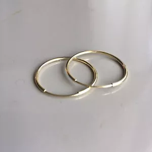 Pair of 21-22 mm, 14K Yellow Solid Gold Seamless Hoop Earrings marked 14K - Picture 1 of 6