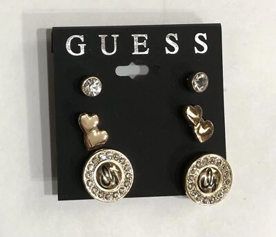 Aretes de firma en forma de corazón con estrás de oro GUESS (A) 186 Foto 1 de 4