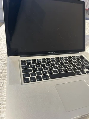 Apple A1286 MacBook Pro 15"  Core 2 duo 2GB  - Image 1 of 4
