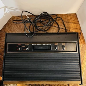 Two Atari 2600 woodgrain console with 5 controllers and 17 games - Picture 1 of 13