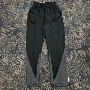 Pantalones deportivos Nike Air Jordan para hombre M negros equipo de vuelo Jumpman Dri-Fit cremallera al tobillo - Imagen 1 de 10