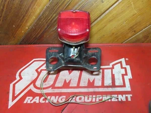 1974 Honda CB125 OEM rear tail brake light with plate mount bracket - Picture 1 of 8