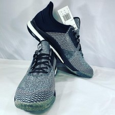 white adidas shoes with black stripes womens