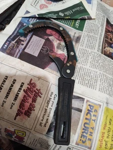 Herramienta de llave de filtro de aceite Western Auto Wizard de colección - Imagen 1 de 8