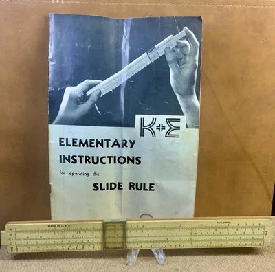 Instrucciones elementales de K&E para operar la regla deslizante y una regla de colección Foto 1 de 4